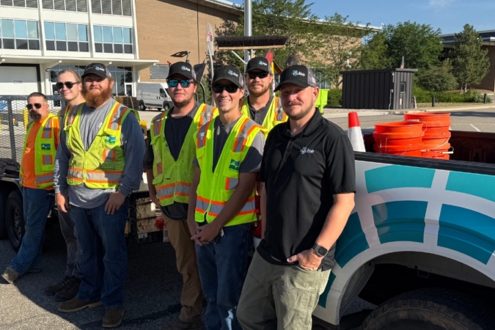 A Team of Pulse installers standing next to a Pulse truck