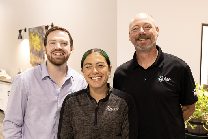 Photograph of 3 smiling Pulse employees